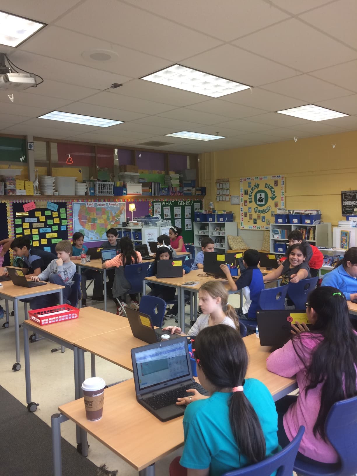 Students coding together at a Codemoji classroom
